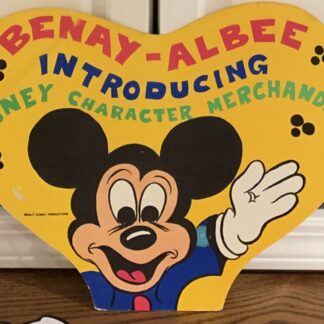 Yellow heart-shaped Benay-Albee Disney merchandise display sign featuring Mickey Mouse